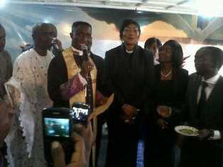 Pastor Okpe with Eucharia Anunobi during her ordination