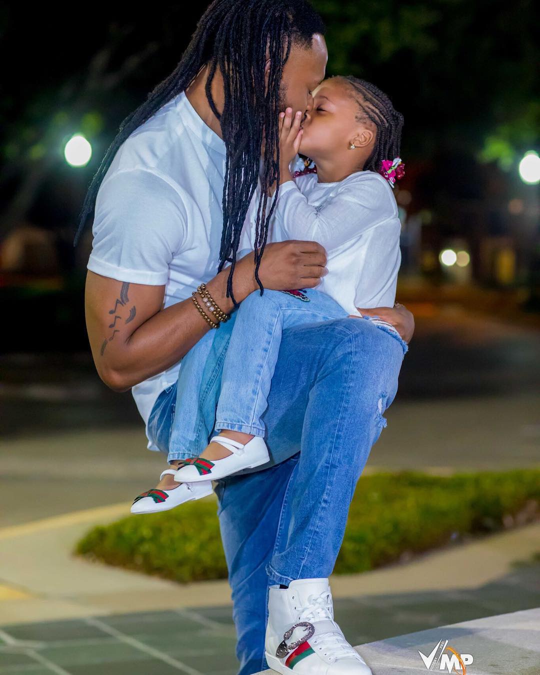 Singer Flavour Pictured Kissing His 3-Year-Old Daughter As She Marks Birthd...