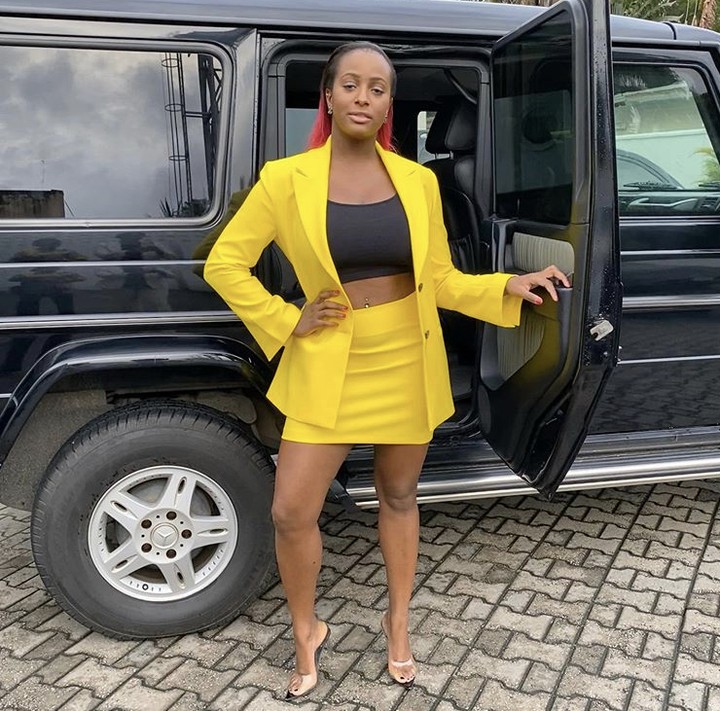 DJ Cuppy Poses With Her G Wagon In A Corporate Outfit (Photos) 2