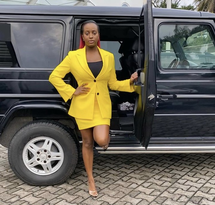 DJ Cuppy Poses With Her G Wagon In A Corporate Outfit (Photos) 3