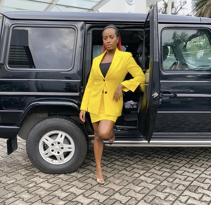 DJ Cuppy Poses With Her G Wagon In A Corporate Outfit (Photos) 1