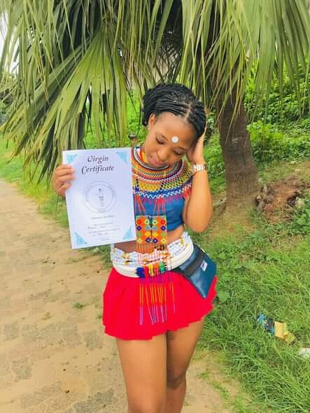 Southafrican Lady Displays Her Certificate Of Virginity 