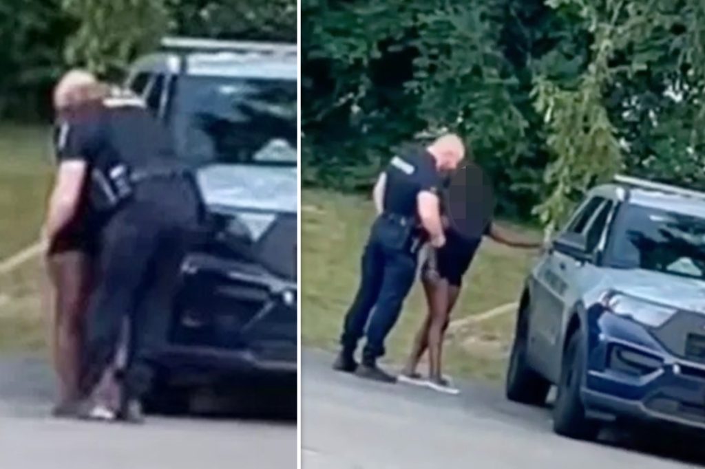A Us Police Officer Has Found Himself In Trouble After He Was Filmed Kissing A Lady Before They 0155